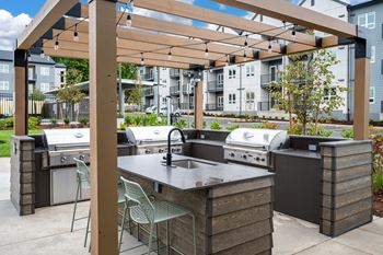 Outdoor plaza with bbq & picnic area